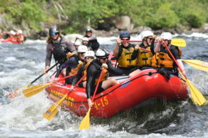 Family whitewater rafting on the Kennebec River in Maine 