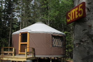 Brown family sized yurt at Northeast Whitewater's campground in the Maine woods