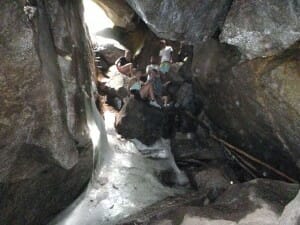 People Climbing Down a Mountain Trail