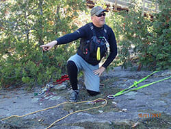 Man Giving Out Instruction in the Forest