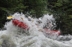 Rafting with Northeast Whitewater on the Dead in Maine. Huge splash