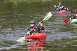 man kayaking in maine